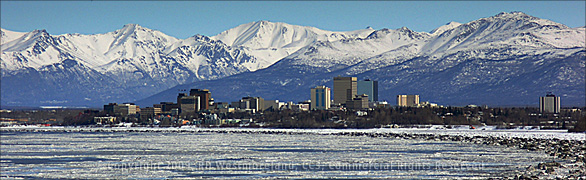 Panoramic View of Anchorage, Alaska in the Dead of Winter with the Cook Inlet in the Foreground and the Chugack Mountain Range Behind it