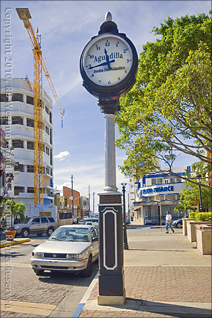 Clock on Plaza of Aguadilla with Hotel Construction in the Background in Puerto Rico