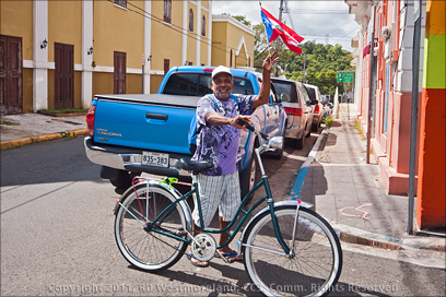 Puerto Rican Posing on Bike Near the Plaza of Juncos, Puerto Rico