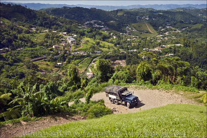 Duce-and-a-Half on its Way up to Cerro de Nandy near San Larenzo, Puerto Rico With View Over Valley