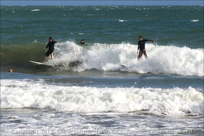 Surfers on Punta Pozuelo Beach Near Guayama, PR